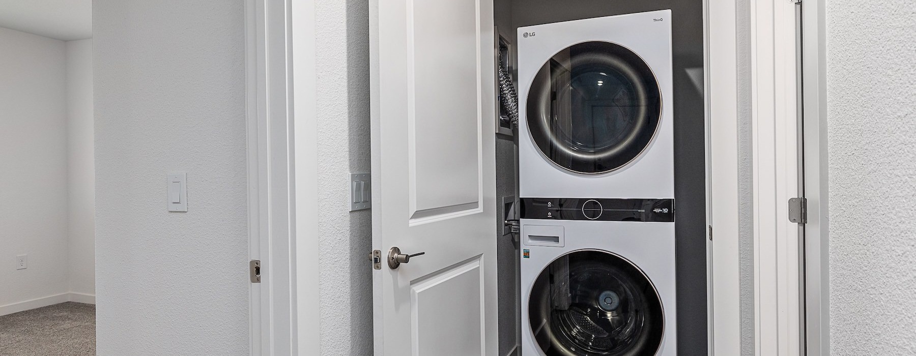 a washer and dryer in a closet